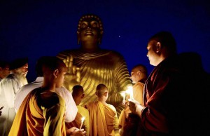 Buddhist monks offer prayers on the eve of Buddha Purnima, in Bhopal on May 3, 2015.