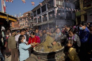 Nepalese Buddhists light incense sticks at the Boudhanath Stupa during Buddha Jayanti, or Buddha Purnima, festival in Kathmandu, Nepal, Monday, on May 4, 2015. Hundreds of people have visited Buddhists shrines and monasteries in Nepal’s quake-wracked Kathmandu on the birthday of Gautama Buddha to pray for the country and the people who suffered during April 25 earthquake