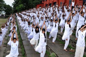 Students practise yoga to mark International Yoga Day at Dharamsala on June 15, 2015