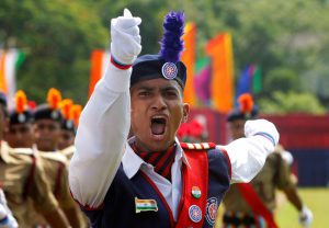 A cadet from the National Cadet Corps (NCC) commands a parade during Independence Day celebrations in Agartala.