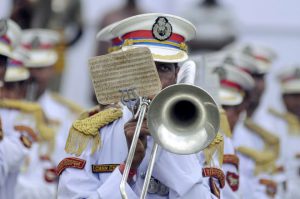 A paramilitary force trooper plays a trumpet during the final dress rehearsal for Independence Day celebration in Agartala, capital of northeastern state of Tripura on August 13, 2016