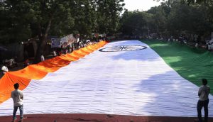 Activists unfurl a large Indian flag at Jantar Mantar to mark former president APJ Abdul Kalam’s 85th birth anniversary in New Delhi on October 15, 2016.