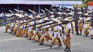 Artists march with ploughs during the 70th Independence Day celebration at Red Road in Kolkata