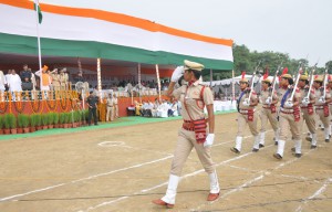 Chief Minister Manohar Lal Khattar taking salute from a marching contingent during the state-level Independence Day function at Dronacharya Stadium in Kurukshetra