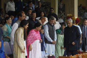 Jammu and Kashmir Chief Minister Mufti Mohammad Sayeed walks past former CM Omar Abdullah and PDP party president Mehbooba Mufti during the Independence Day celebrations at Bakshi Stadium in Srinagar