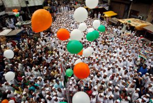 People look at balloons released during a march to celebrate Independence Day in Ahmedabad on August 15.