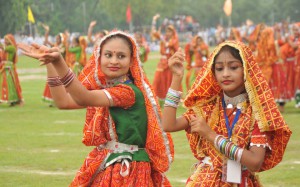 Students perform during the state-level Independence Day function at Dronacharya Stadium in Kurukshetra