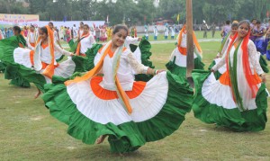 Students perform during the state-level Independence Day function at Dronacharya Stadium in Kurukshetra