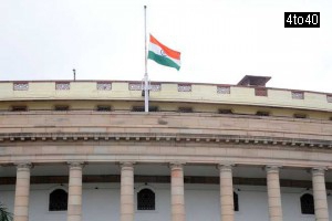 The national flag flies at half-mast at Parliament House in New Delhi to mourn former President APJ Abdul Kalam's demise in New Delhi on July 28, 2015.