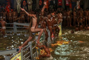 A Sadhu, or Hindu holy man, jumps in a holy pond during the second ‘Shahi Snan’ (grand bath) at ‘Kumbh Mela’, or Pitcher Festival, in Trimbakeshwar September 13, 2015