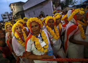 Devotees attend a procession before taking a dip in a holy pond during the second ‘Shahi Snan’ (grand bath) at Kumbh Mela, or Pitcher Festival, in Trimbakeshwar on September 13, 2015