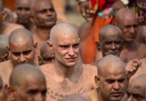 Newly-initiated Naga Sadhus perform rituals at the bank of Ganga river during the ongoing Kumbh Mela festival 2019, in Allahabad.