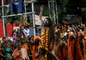 Sadhus, or Hindu holy men, attend a procession before taking a dip in a holy pond during the second ‘Shahi Snan’ (grand bath) at the Kumbh Mela or Pitcher Festival in Nashik on September 13, 2015