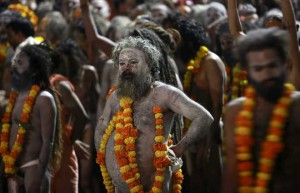 Sadhus, or Hindu holy men, wait during a procession before taking a dip in a holy pond during the second ‘Shahi Snan’ (grand bath) at Kumbh Mela, or Pitcher Festival, in Trimbakeshwar on September 13, 2015