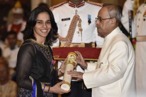 Badminton player Saina Nehwal (left) poses as she receives The Padma Bhushan Award from President Pranab Mukherjee during an investiture ceremony at Rashtrapati Bhawan(The Presidential Palace)in New Delhi on March 28, 2016