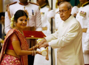 Folk singer Malini Awasthi receives the Padma Shri Award from President Pranab Mukherjee to during an investiture ceremony at Rashtrapati Bhawan in New Delhi on March 28, 2016