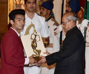 President Pranab Mukherjee presents Arjuna award to Boxer Shiv Thapa at the National Sports and Adventure Awards function at Rashtrapati Bhawan in New Delhi on August 29, 2016.