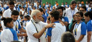 Prime Minister Narendra Modi greets participants on the occasion of the 2nd International Day of Yoga at the Capitol Complex in Chandigarh