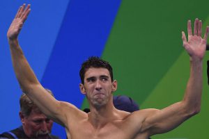 Gold medallist USA’s Michael Phelps, reacts after the Men’s swimming 4 x 100m Medley Relay Final at the Rio 2016 Olympic Games at the Olympic Aquatics Stadium in Rio de Janeiro on August 13, 2016.