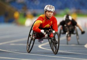 Huang Lisha of China looks up after winning the gold medal in Women’s 100m T53 Final of the Rio 2016 Paralympic Games at Olympic Stadium in Rio de Janeiro on September 8, 2016.