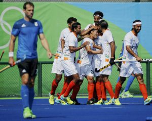 India’s Chinglensana Singh (C) celebrates with his teammates after scoring a goal during the men’s field hockey Argentina vs India match of the Rio 2016 Olympics Games at the Olympic Hockey Centre in Rio de Janeiro on August 9, 2016.