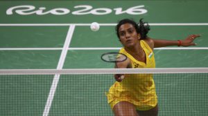 India’s PV Sindhu plays against China’s Wang Yihan during their women’s singles quarterfinal badminton match at the Riocentro stadium in Rio de Janeiro on August 16, 2016, at the Rio 2016 Olympic Games