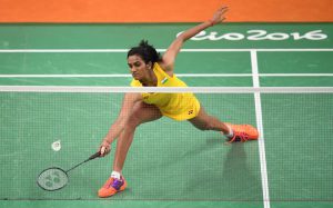 India’s PV Sindhu returns against China’s Wang Yihan during their women’s singles quarterfinal badminton match at the Riocentro stadium in Rio de Janeiro on August 16, 2016, at the Rio 2016 Olympic Games.