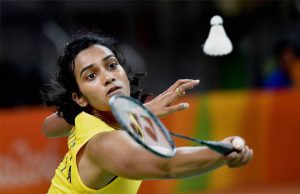 India’s PV Sindhu returns against China’s Wang Yihan during their women’s singles quarterfinal badminton match at the Riocentro stadium in Rio de Janeiro on August 16, 2016, at the Rio 2016 Olympic Games. Sindhu won the match 22-20, 20-19.