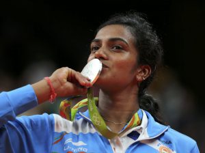 India’s Pusarla V Sindhu poses kissing her silver medal at the Riocentro stadium in Rio de Janeiro on August 19, 2016