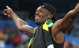 Jamaica’s Usain Bolt celebrates his team’s victory at the end of the Mens 4x100m Relay Final during the athletics event at the Rio 2016 Olympic Games at the Olympic Stadium in Rio de Janeiro on August 19, 2016