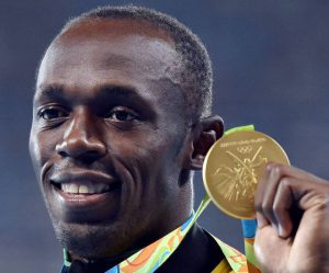 Jamaica’s Usain Bolt holds up his gold in men’s 200-meter at the 2016 at the Olympic stadium in Rio de Janeiro, Brazil, on August 19, 2016