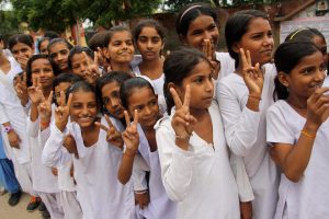 Little girls eagerly wait for Sakshi Malik at Ismaila in Rohtak