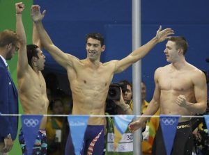 Michael Phelps, Cody Miller and Ryan Murphy of USA celebrate winning the gold Medal in the Men’s 4 x 100m Medley Relay Final at Olympic Aquatics Stadium in Rio de Janeiro, Brazil, on August 13, 2016.