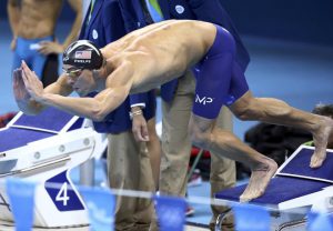 Michael Phelps (USA) of USA dives to start his leg of the relay in the Men’s 4 x 100-meter medley relay final during the swimming competitions at the 2016 Summer Olympics, August 14, 2016, in Rio de Janeiro, Brazil.