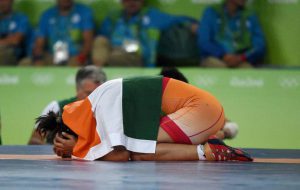 Sakshi Malik celebrates after winning bronze against Kyrgyzstan’s Aisuluu Tynybekova in the women’s wrestling freestyle 58kg