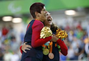 Shawn Morelli (USA) and Megan Fisher (USA) at the podium with their gold and bronze medals in Women’s C4 3000m Individual Pursuit at the Olympic Velodrome in Rio de Janeiro, Brazil, on September 8, 2016.