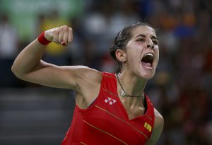 Spain’s Carolina Marin celebrates during her match against India’s Pusarla V Sindhu during their women’s singles Gold Medal badminton match at the Riocentro stadium in Rio de Janeiro on August 19, 2016, for the Rio 2016 Olympic Games. World No 1 Marin beat Sindhu 19-21, 21-12, 21-15 to win gold.