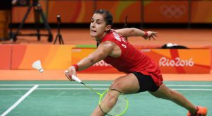 Spain’s Carolina Marin returns against India’s Pusarla V Sindhu during their women’s singles Gold Medal badminton match at the Riocentro stadium in Rio de Janeiro on August 19, 2016, for the Rio 2016 Olympic Games. World No 1 Marin beat Sindhu 19-21, 21-12, 21-15 to win gold.