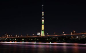 The landmark Tokyo Skytree, the tallest structure in Japan, is seen illuminated in the yellow and green colours of the Brazilian flag in Tokyo on August 4, 2016, to celebrate the Rio de Janeiro Olympic and Paralympic Games. The illumination will continue for the duration of the Olympics until August 22 and restart for the Paralympic games from September 6 until September 19.