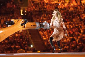 American Paralympic snowboarder Amy Purdy dances with a robot during the opening ceremony of the Rio 2016 Paralympic Games at the Maracana stadium in Rio de Janeiro on September 7, 2016.