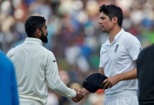 India’s captain Virat Kohli (L) is congratulated by England’s captain Alastair Cook after India won the test series at the MA Chidambaram Stadium in Chennai on December 20, 2016.