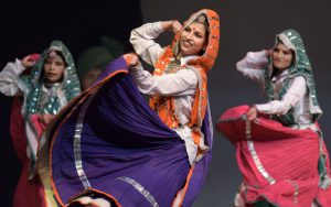 Participants perform Haryanavi dance during 31st state level Haryana Day celebration 'Ratnawali' at Kurukshetra University in Kurukshetra.