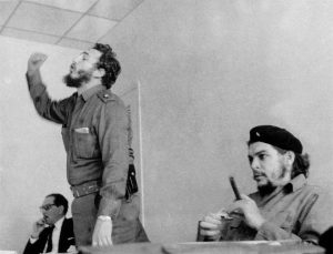 This file photo taken in the 60s shows Cubas Prime Minister Fidel Castro (C) speaking during a meeting next to Ernesto Che Guevara in Havana.