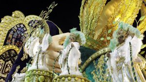 Dancers from the Vila Maria samba school perform on a float