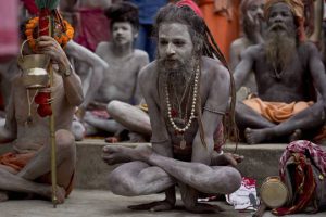 A sadhu or Hindu holy man performs Yoga to mark International Yoga Day at Kamakhya temple in Guwahati, Assam.