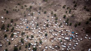 Aerial view of the new settlement of displaced families in Aburoc, South Sudan on June 5, 2017. Government offensives on the West Bank of the Nile river in April and May 2017 led to the capture of several villages, including Kodok. Up to 25,000 people were displaced during these clashes, most of whom initially fled toward Aburoc. In subsequent weeks, at least 20,000 people fled to Sudan. Many of those in Aburoc walked for days on foot to reach the location without access to sufficient water due to conflict along the River Nile and arrived exhausted and weak.