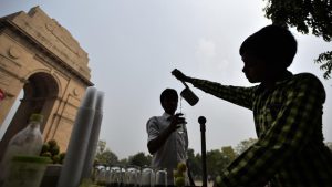 An 11-year-old boy sells lemonade near India Gate, in New Delhi. According to the UNICEF, there are approximately more than 28 million children under the age of 14 working as child labourers in India. Child labor is widely prevalent in India despite laws that seek to keep children in school. These laws are regularly flouted as large numbers of children are forced into difficult and dangerous jobs.