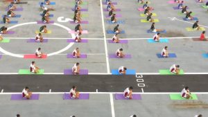 Indian Naval Cadets perform yoga on the deck of INS Virat on International Yoga Day in Mumbai, Maharashtra