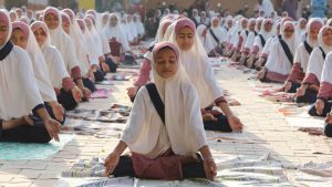 Students practice yoga ahead of International Yoga Day at a school in Ahmedabad, Gujarat on June 17, 2017. Yoga is being promoted by the Permanent Mission of India to the UN as a holistic means of promoting mental and physical wellbeing. The ancient practice which originated in India, has followers taking to their mats all over the world. As a nod to this global appeal of yoga, the UN observes June 21 as International Day of Yoga. Here’s how India’s been getting it’s asanas down pat.