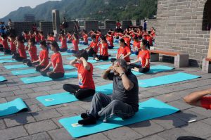 Minister of State for External Affairs VK Singh doing Bhramari Pranayam, a breathing technique at The Great Wall of China, a day ahead of International Yoga Day, in Beijing on June 20, 2017